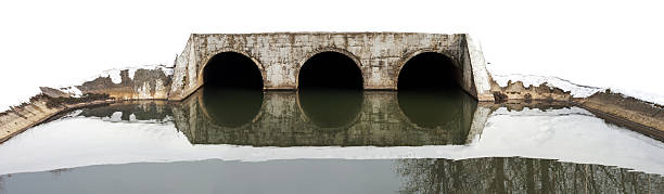 istock old dam on small river in the winter 175690929