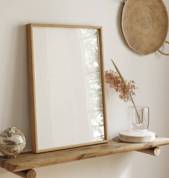istock Mock up poster frame close up on shelf with decoration 1756915272