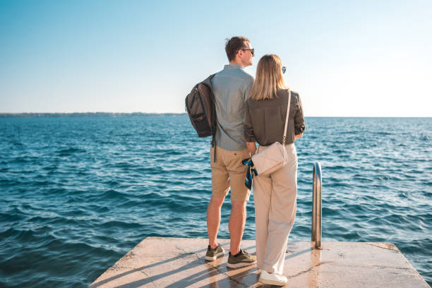istock Romantic Mid Adult Couple Relaxing While On Vacations 1756942914