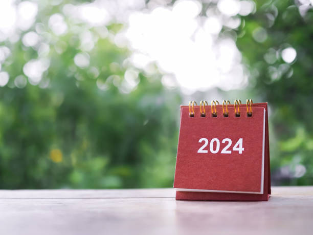 istock Close up 2024 desk calendar on the table with copy space. Resolution, Goal, Action, Planning, and manage to success business. 1756946700