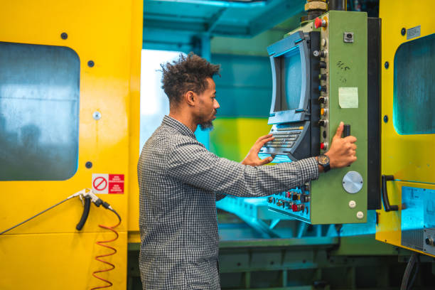 istock Mid Adult Black Male CNC Machine Operator 1756949370