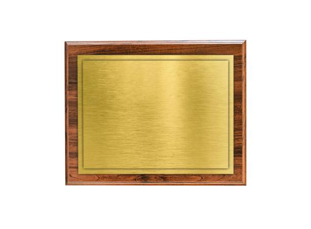 Wooden board with gold plate isolated on white background. plaque with gold overlay for text Wooden board with gold plate isolated on white background. Wooden plaque varnished with gold overlay for text. Template for award bronze plaque texture stock pictures, royalty-free photos & images