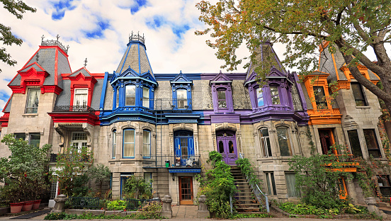 Montreal, Qc, Canada - October14th, 2023: Victorian architecture and colorful houses facade of Square St Louis in Montreal