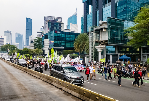Jakarta, Indonesia - 22 Sept 2022: Demonstration or protest on Jakarta against Omnibus Law or Job Creation Act or UU Cipta Kerja.