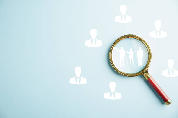 istock Focused magnifying glass on job search concept 1757110669