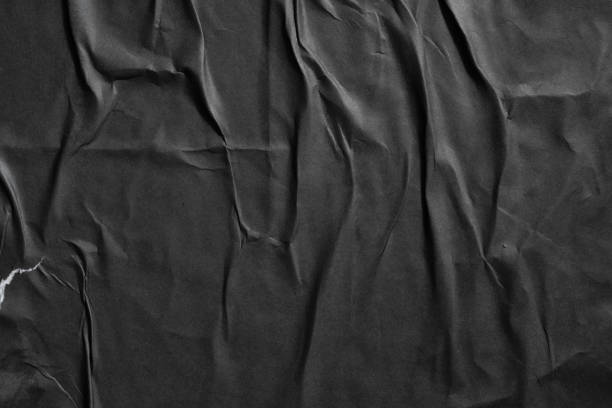 istock Glued black paper poster texture background 1757117849