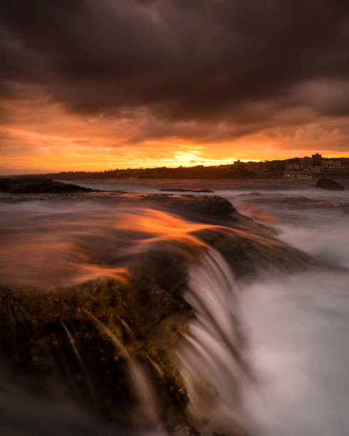 Sunset by the sea Beautiful sunset by the sea, Sydney Australia bondi beach sunrise stock pictures, royalty-free photos & images