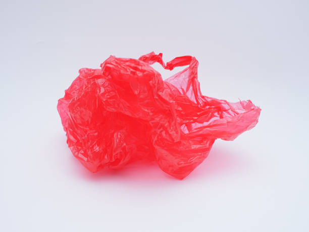 istock red plastic bag trash isolated on white 1757130594