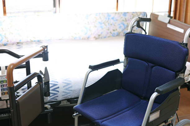 istock Foldable small wheelchair and electric bed for nursing care 1757138923