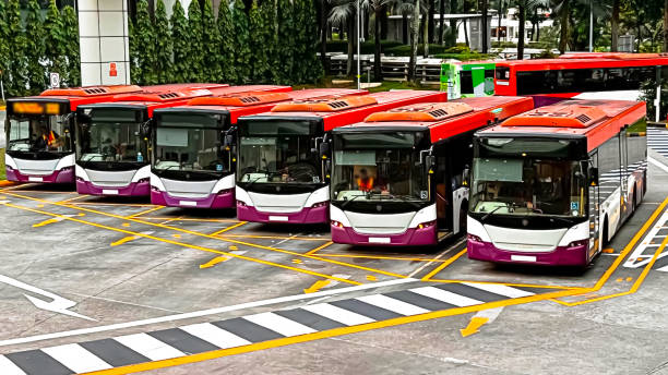 Public commuter buses at a busy bus terminal in Singapore Public transport is designed to provide an efficient and affordable means of transportation for people who do not have access to private vehicles It typically includes various modes of transportation, such as buses, trains, trams, subways, ferries, and light rail. muster station stock pictures, royalty-free photos & images