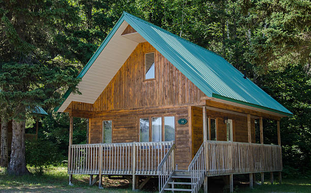 Wooden Cottage, Log Cabin, Canada, forest, timber Beautiful wooden house in the forest in Canada. Dream house. sod roof stock pictures, royalty-free photos & images