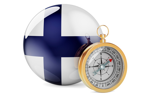 Compass with Finnish flag. Travel and tourism in Finland concept. 3D rendering isolated on white background