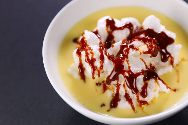 istock floating island with custard cream and caramel ( Ile flottante, French food) 1757211191