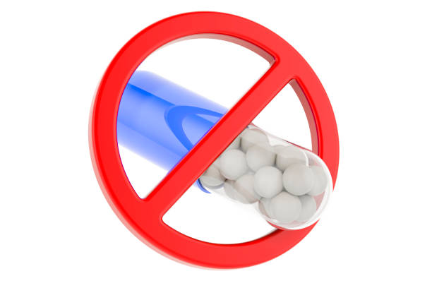 Medicament capsule with forbidden symbol, 3D rendering isolated on white background