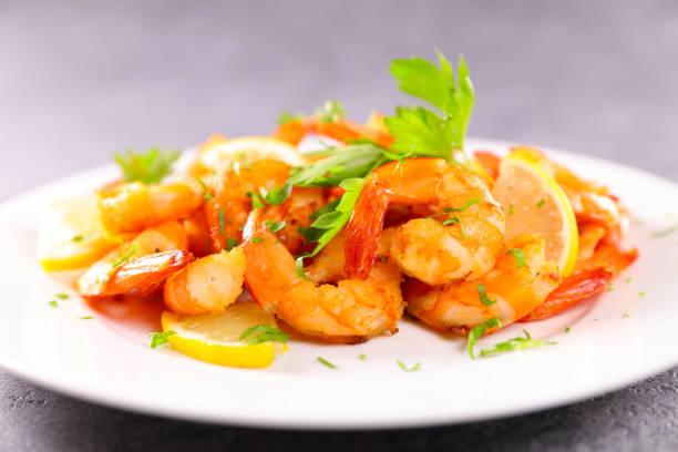 istock grilled shrimps with herbs and lemon on plate 1757217234