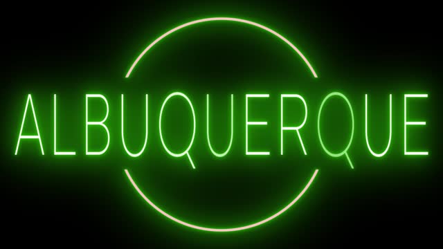 Glowing and blinking green retro neon sign for ALBUQUERQUE
