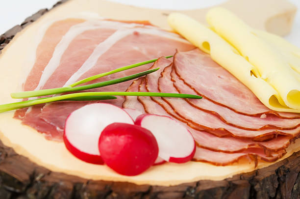 istock Appetizer of prosciutto on the wood board 175724181