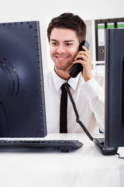istock Stock broker talking on a phone 175724299