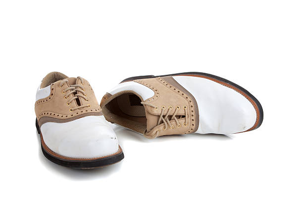 istock Pair of golf shoes on white 175724700