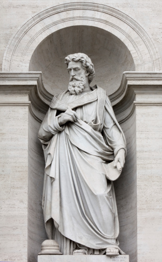 Neoclassic marble statue in its niche, in Rome