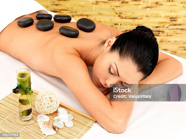 Stone Massage For Woman At Spa Salon Stock Photo - Download Image Now - Adult, Adults Only, Alternative Therapy