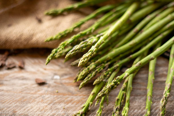 istock Fresh Asparagus on a Wooden Table 1757278232