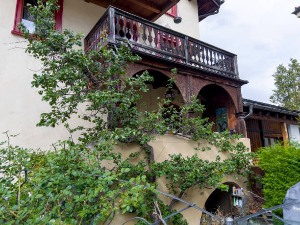 An old house with the wooden balcony.