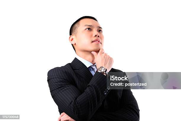 Handsome Young Asian Business Man Thinking Stock Photo - Download Image Now - Adult, Adults Only, Asian and Indian Ethnicities