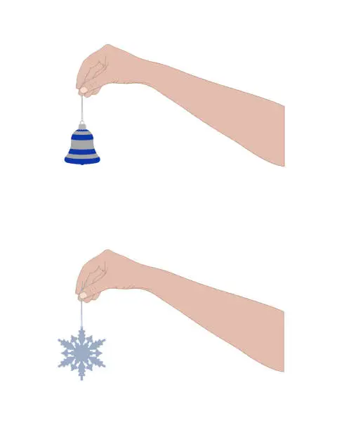 Vector illustration of Illustration of hands holding Christmas bell and snowflake decorations