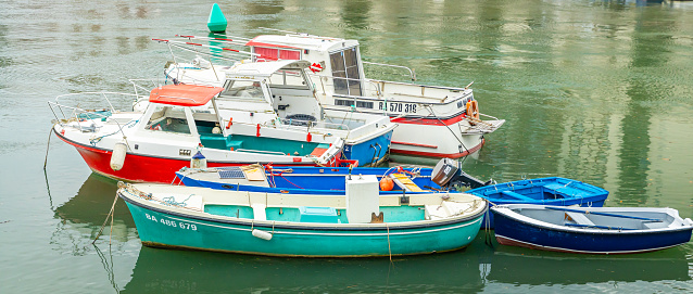 Motorboats of the marina of St Jean de Luz on the Nivelle river in France