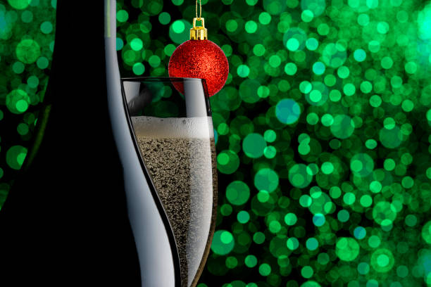 istock Champagne with Christmas ornament against defocused illumination. 1757334975