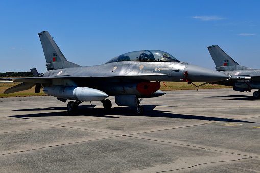 Beja, Portugal: parked General Dynamics F-16 Fighting Falcon of the Portuguese Air Force - twin-seat F-16 BM pilot training version of the jet fighter, equipped with external fuel tanks - Beja Airport serves both civil and military aviation.