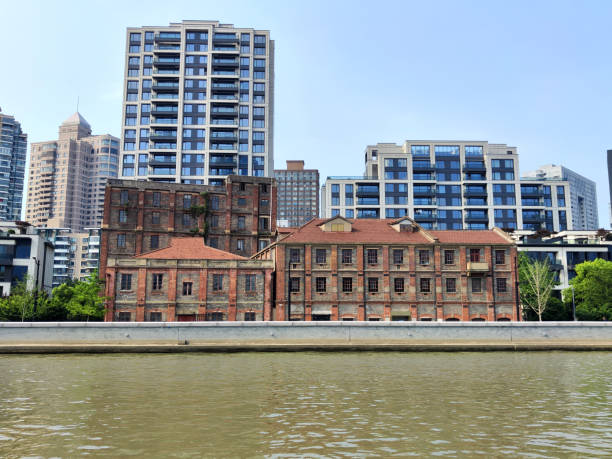 Foo Sing flour mills old building overlooking Suzhou creek, Shanghai, China
