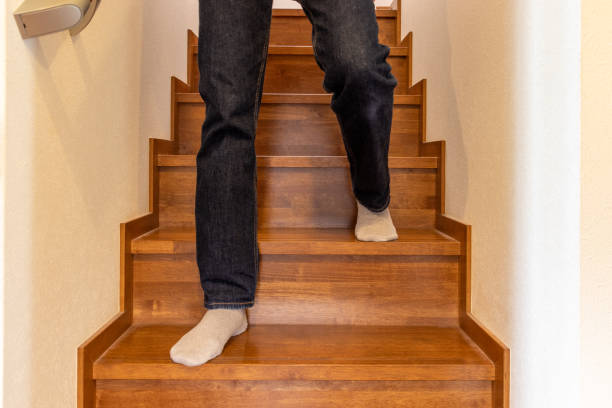 A person coming down the stairs