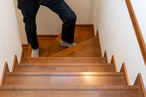 istock A person climbing wooden stairs 1757373316