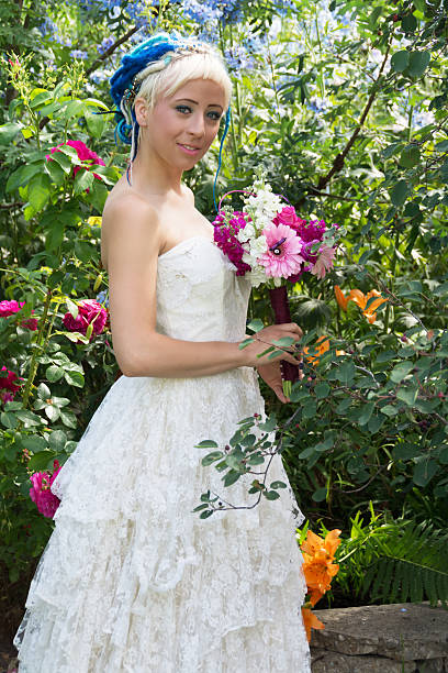 istock Side view of smiling bride with blue dreadlocks. 175739494
