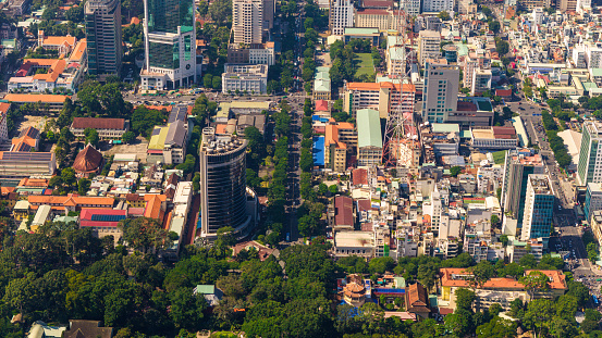 Aerial view of Ho Chi Minh City skyline and skyscrapers in center of heart business at Ho Chi Minh City downtown. Cityscape and many buildings, local houses