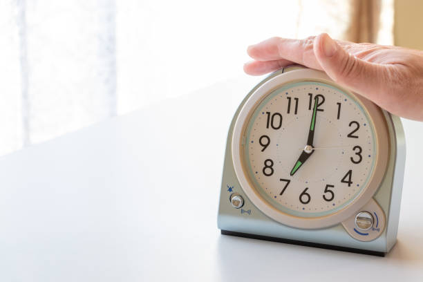 istock Press the button on the alarm clock to stop the alarm 1757400030