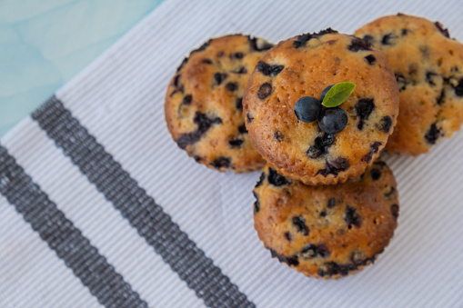 Homemade baked fresh blueberry muffins. Tasty pastry sweet cupcake dessert. Berry pie Healthy vegan cupcakes with organic berries. Gluten free healthcare recipe from alternative flour