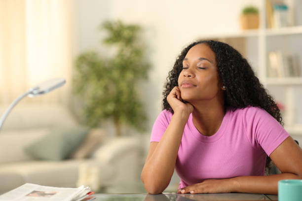 istock Black woman resting breathing at home 1757421977