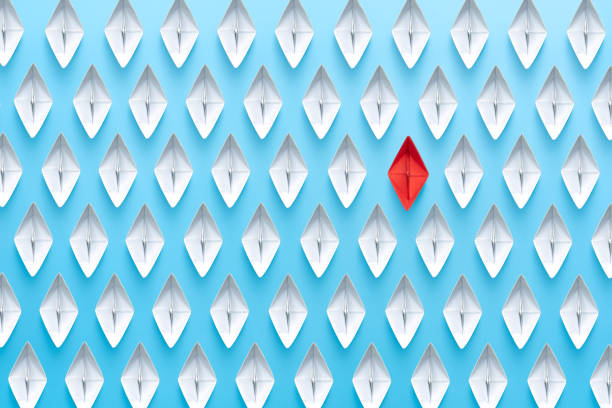 istock Paper ship that are different from other ships in the group on blue background, Business for new ideas creativity, innovative and solution concept. 1757429105