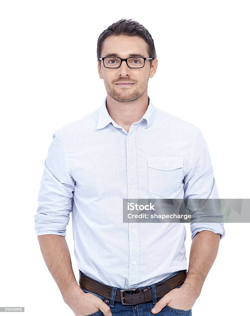 Portrait of comfortable young man A friendly man wearing spectacles smiling as he stands isolated against a white background 30-34 Years Stock Photo
