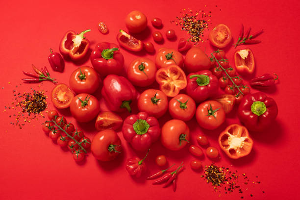 istock Group of red vegetables isolated on red background 1757432317