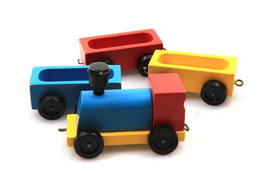 old wooden train toy isolated on the white background