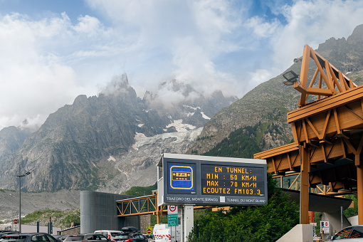 Courmayeur, Aosta Valley, Italy - 07 24 2023: The Mont Blanc Tunnel is a highway tunnel between France and Italy, under the Mont Blanc mountain in the Alps. It links Chamonix, Haute-Savoie, France with Courmayeur, Aosta Valley, Italy.