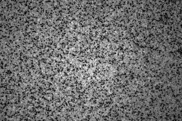 Concrete stone texture. Marbled pattern of a light gray stone slab.