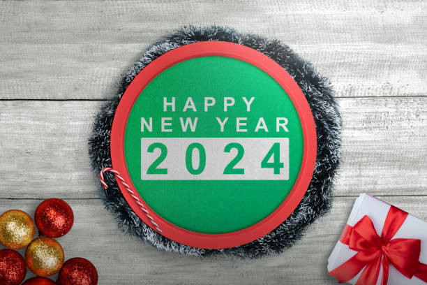 Happy New Year 2024 2024 with a Christmas ornament. Happy New Year 2024  Spotify Completed   New Year  Party stock pictures, royalty-free photos & images