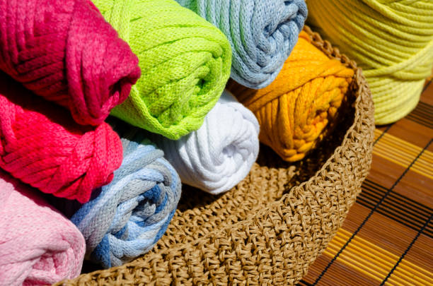 istock Cotton cord. Rolls of multi-colored yarn for weaving macrame. 1757476181
