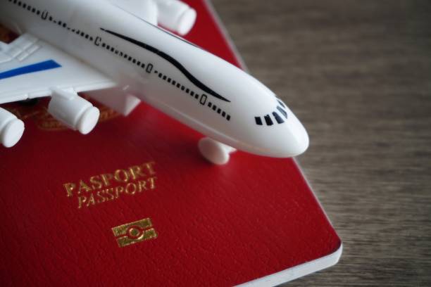 istock Closeup image of toy plane and passport. 1757478919