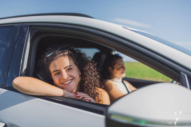 istock Friends driving in car together 1757493559